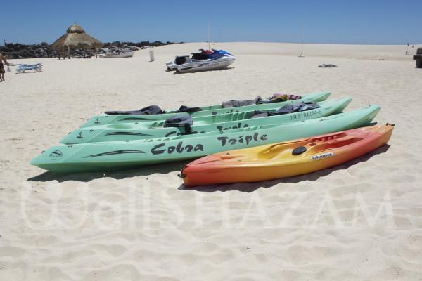 Colorful Kayaks on Beach